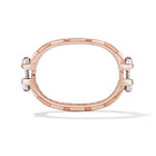 14k rose gold pink sapphire Coupling bracelet, vertical view of sculpted hardware-inspired articulated links.